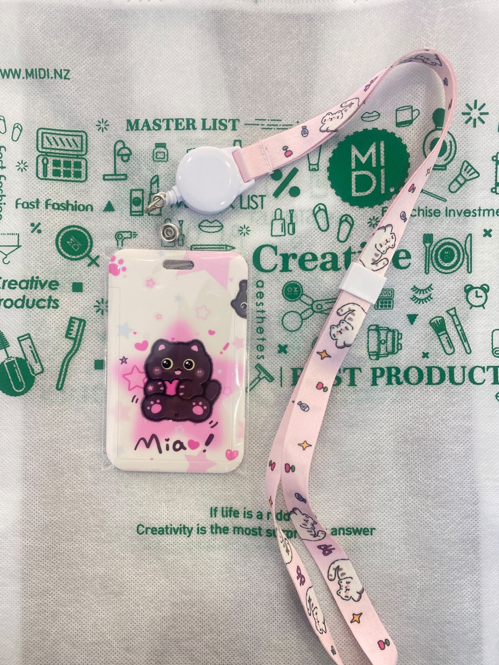 Cartoon clipon + retractable hanger cord